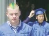 By Greg Farrar Nate Williams removes his graduation cap to reveal painted stripes on his hair after the end of Hazenâs commencement exercises.