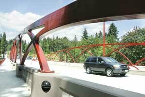 The May Creek Bridge, open to traffic May 26, features wider sidewalks. By Greg Farrar 