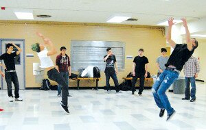 By Christina Corrales-ToyTwo members of Hazen High School’s Breakdancing Club perform back handsprings at the club’s Jan. 17 meeting.