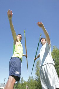 By Greg Farrar Matt Campbell (left) and 2-minute-older twin brother Sean, Liberty High School seniors, pose with their javelins.