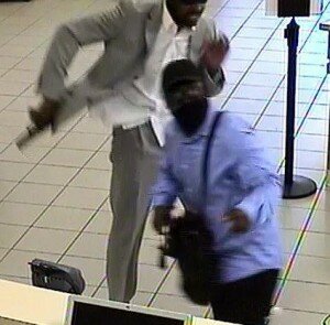 King County Sheriff's Office Two masked men rob the Newcastle Bank of America July 1.
