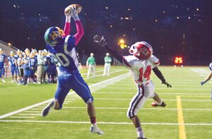 By Rob Nichols JD Peterson leaps in the end zone for a 10-yard touchdown pass from quarterback Nolan Hoover in Hazen’s 32-24 loss to Kennedy Catholic Oct. 4.