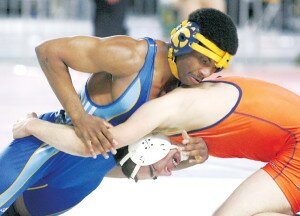 By Greg Farrar Malik Haythorne (left), Hazen High School senior, works to get a takedown against Decatur senior Christian Aragon in his first round 152-pound bout during the 3A state wrestling championships Feb. 21 at the Tacoma Dome. Haythorne won by pin at 5:51 in the match on the way to his second place state award.