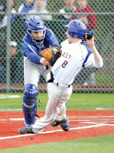 By Greg Farrar Tyler Haselman, Liberty High School sophomore catcher, tags out Hazen’s J. Crosby in the top of the fourth on a spot-on throw from Liberty freshman centerfielder Torey Anderson.