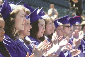 By Greg Farrar Liberty High School seniors cheer during last year's graduation ceremony at Safeco Field.