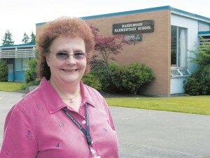 By Megan Erb Then-Hazelwood Elementary School Principal Mary Ford stands in front of the old school building during its final days in 2005. Students returned that fall to a new Hazelwood built just next door. The building has been home to the Renton Academy, a kindergarten through 12th-grade special-education school, since 2006. Demolition of the structure begins this summer to make way for a new middle school set to open in fall 2016.