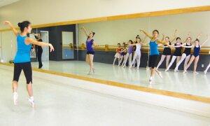 By Christina Corrales-Toy Cornerstone Studio students use the mirror to watch their movements as they rehearse the dance school's production of 'The Nutcracker' in 2013.