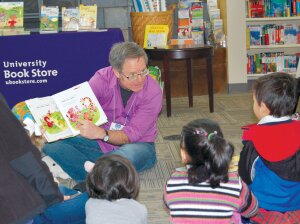 By Christina Corrales-Toy By Christina Corrales-Toy Author Dana Sullivan reads his book, ‘Kay Kay’s Alphabet Safari’ to a group of children at Bellevue’s University Bookstore Jan. 22.