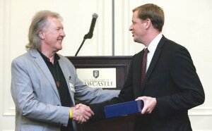 File Newcastle Mayor Steve Buri (right), seen here giving David Harris the Newcastle Chamber of Commerce’s Mayor’s Award at the 2014 Diamond Awards, will give his State of the City speech Feb. 11.