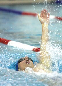 By Greg Farrar Nolan Hoover, Hazen High School senior, races to win his 100-yard backstroke race with a time of 1 minute, 0.64 seconds, during the Highlanders’ Jan. 20 swim meet against Liberty.