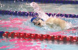 By Greg Farrar Turner Englehart, Hazen High School senior, drives through the water while winning his 200-yard freestyle race in a time of 1 minute, 58.53 seconds during the Highlanders’ swim meet Jan. 20 against Liberty.