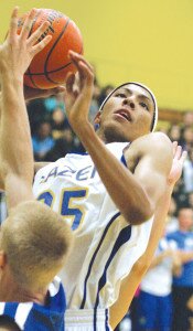 By Greg Farrar Hazen senior Dominic Green goes for the score in the Highlanders win over Liberty. Green recently switched his pledge from ASU to UW.