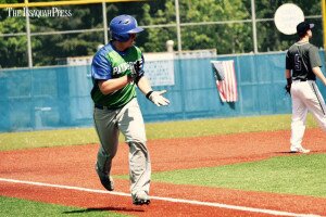 By Christina Corrales-Toy Liberty High School first baseman James Workman claps as he trots to home plate, after scoring the Patriots' first run in a 10-0 win over Foster May 9. 