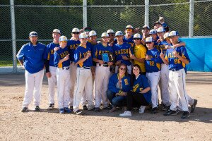 Contributed The Hazen High School baseball team hosts the league trophy, after earning a share of the Seamount League title May 4.