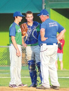 By Karen Calcaterra Liberty High School pitcher Nate Steffens and catcher Tyler Haselman conference with head coach John Martin in the Patriots’ 6-2 loss to Centralia in the Class 2A state baseball semifinals May 29 at Yakima’s County Stadium.