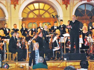 Contributed Newcastle composer Bob Ingalls encourages the crowd to applaud the Lviv Philharmonic Orchestra and Galician Academic Chamber Choir after they performed his award-winning ‘Ave Maria for Choir & Strings’ in Ukraine May 10.