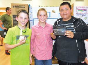 By Christina Corrales-Toy Newcastle Elementary School students (from left) Rex Ryan, Charlie Arnold and David Jimenez explored how insects affected plants for their fifth-grade science project. The school held a science symposium June 12, where students showed off their projects. ‘The students did an amazing job showcasing their findings and sharing their discoveries with an authentic audience,’ said fifth-grade teacher Liza Rickey.