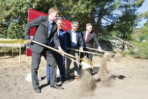 By Greg Farrar Breaking ground on Aegis Gardens July 30 are (from left) Newcastle Mayor Steve Buri; Aegis Living founder and CEO Dwayne Clark; former U.S. ambassador to China, Washington state governor and King County Executive Gary Locke; and current King County Executive Dow Constantine.