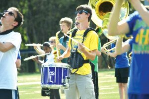 By Christina Corrales-Toy Hazen High School senior Devin Dolling plays the drum at an Aug. 18 preseason practice of the school’s new marching band.
