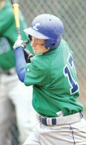 Liberty sophomore John McLeod strokes an RBI single in the top of the sixth inning against Issaquah High School on May 10. Photo by Greg Farrar