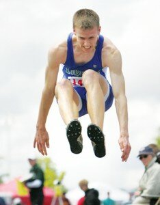 By Greg Farrar Devin Bennett, Liberty High School senior, flies in the air for his 44-foot, 8 1/2-inch triple jump, to take fifth place at the 3A state track championships May 28 in Tacoma.