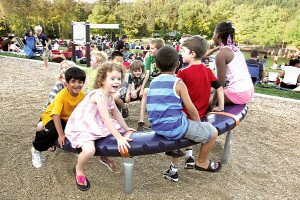 By Greg Farrar Children find fun on the Lake Boren Park playground at one of the city's Concerts in the Park.It's those summer offerings that make the city one of the best in the nation.