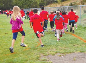 Hazelwood Elementary School students take off running at the school’s 2013 Fun Run.